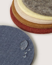 Graf Lantz - Bierfilzl Merino Wool Round Coaster Multi 6 Pack in Santa Fe, showcasing water resistance on grey felt surface, ideal for elegant home décor.