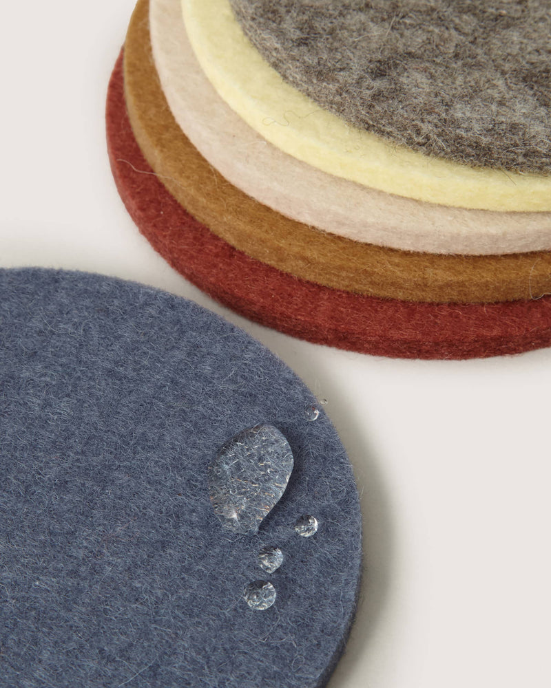 Graf Lantz - Bierfilzl Merino Wool Round Coaster Multi 6 Pack in Santa Fe, showcasing water resistance on grey felt surface, ideal for elegant home décor.
