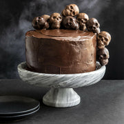 Nordic Ware | Skull Cakelet Pans - Skull Bites: A dark-chocolate cake adorned with skull chocolates, exemplifying spooky baking possibilities. Perfect for Halloween-themed gatherings.