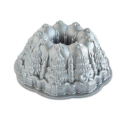Nordic Ware | Very Merry Bundt® Pan featuring intricate holiday designs, perfect for creating stunning centerpiece cakes with even baking and easy release.