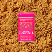 Diaspora Co. Spices - Basiya Ginger in a pink container with a cartoon tiger logo, showcasing heirloom ginger from Madhya Pradesh.
