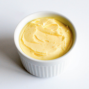 Banner Butter | Sea Salt - 5 oz in a white bowl; small-batch cultured butter infused with cold-smoked hickory sea salt for a savory, smoky flavor.