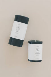 Mo&Co Home - Forest Green Beeswax Pillar Candle, 100% Natural, Handmade, 3x6 Inch. Two candles, one standing, one tilted; elegant decor for gatherings.