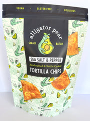 Alligator Pear Foods - Sea Salt & Pepper tortilla chips, 6oz bag featuring a cartoon crocodile and labeled as gluten-free, perfect for pairing with dips.