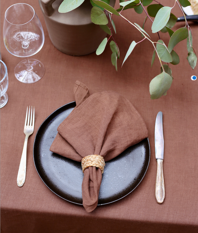 Set of 2 linen napkins on a plate with fork and knife, showcasing premium table decor from Athens Cooks. Ideal for elegant, sustainable dining settings.