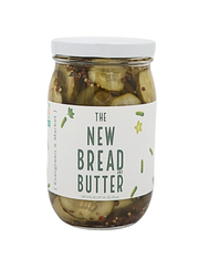 [PICKLES] by Evergreen and Market - The Bread and Butter: Glass jar of sweet, spicy, and sour pickles with visible sliced cucumbers, spices, and brine.