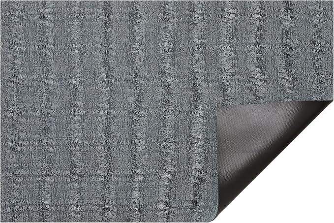 Close-up of the Chilewich | Martha Stewart Heathered Shag - Sea, showcasing its grey textured pattern, ideal for enhancing kitchen decor with style and practicality.