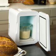 Brod & Taylor SH-100 Sourdough Home: A compact appliance featuring a white container with a clear interior, ideal for home sourdough baking.