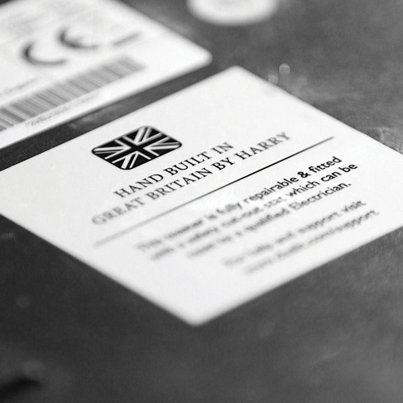 Dualit 2 Slice Classic Toaster with Union-Jack label, highlighting its hand-built, repairable design, lifetime service plan, and energy-efficient features.