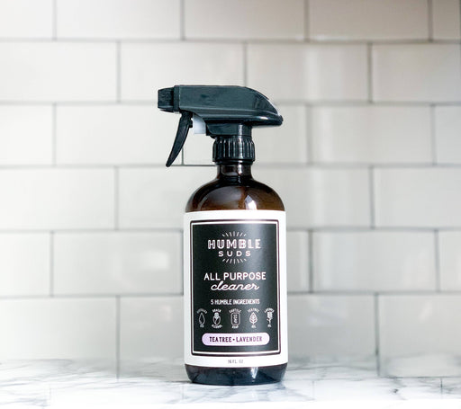 Humble Suds | All Purpose Cleaner in Refillable Glass Bottle - Tea Tree & Lavender, featuring a sprayer and logo, ideal for safe, eco-friendly cleaning.