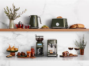 Breville | Smart Grinder Pro amidst styled kitchen setup with matching small appliances, showcasing its versatility for perfect espresso shots or French press brews.