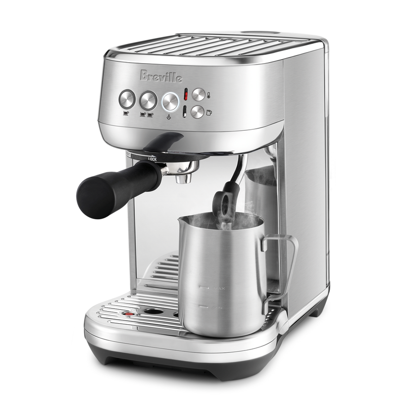 Breville | Bambino Plus espresso machine with portafilter and milk-frothing pitcher, offering professional-grade brewing and microfoam milk capabilities for perfect lattes.