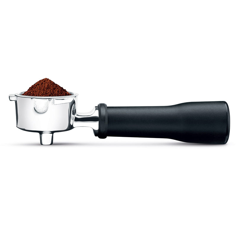 Breville | Bambino Plus portafilter filled with finely ground coffee, highlighting precise espresso preparation as part of Athens Cooks' curated kitchen tools collection.