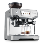 Breville | Barista Touch - Stainless-steel espresso machine with built-in grinder, touchscreen for drink selection, dual spout portafilter, and steam wand for milk frothing.