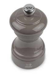 Peugeot | Bistro Salt Mill, Smoked Grey, painted wood with a metal knob, exemplifies French café elegance, crafted in France with a durable steel grinding mechanism.