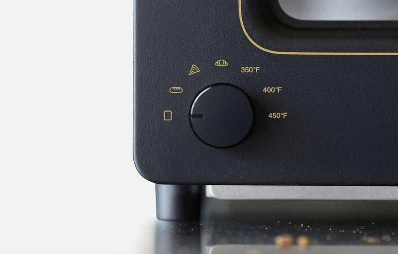 BALMUDA | The Toaster - White, an advanced electronic device utilizing steam technology for precise toasting, ensuring a crisp exterior and soft, flavorful interior.