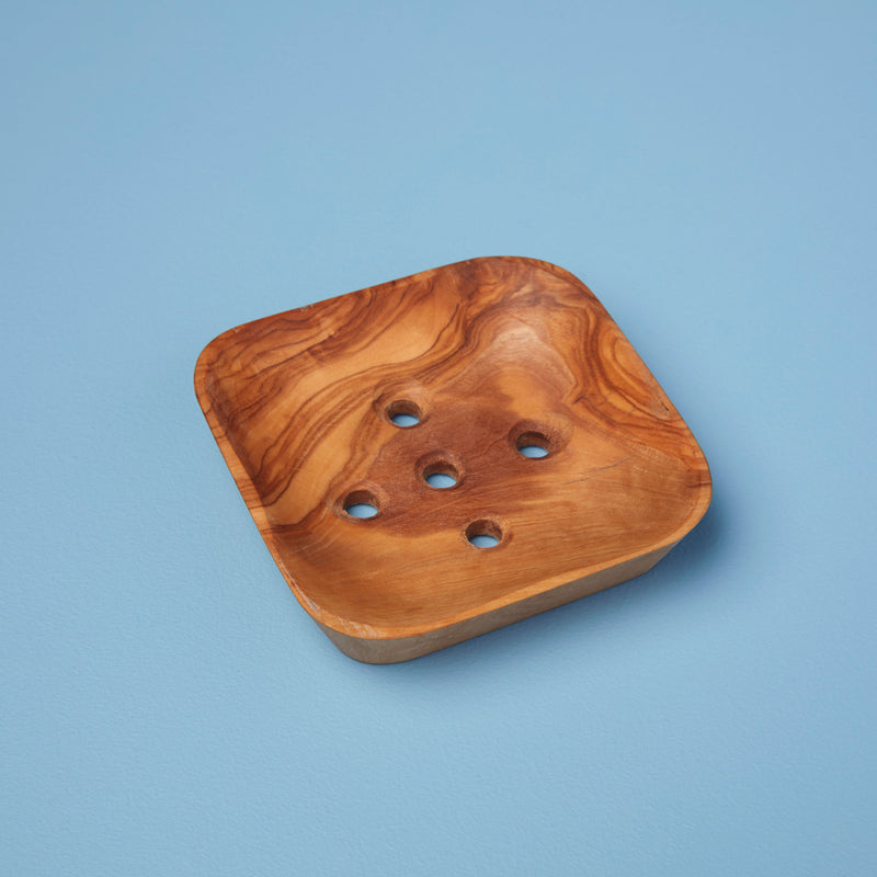 Be Home | Olive Wood Soap Dish: A square wooden dish with holes, designed to stylishly hold soap while keeping kitchen and bathroom surfaces clean.