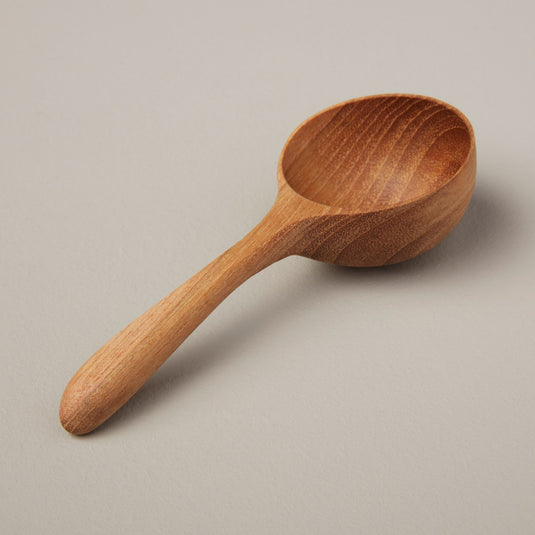 Be Home | Teak Round Scoop, a wooden kitchen utensil, ideal for coffee and bar setups, crafted from sustainably sourced Teak wood.