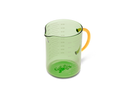 Great Jones | Beyond Measure 4-Cup - Broccoli-Butternut, a durable borosilicate glass measuring cup with precision-pour spout and clear measurements, ideal for kitchen prep and serving.