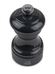 Peugeot | Bistro Salt Mill, Slate with a glossy black, turned-wood body and adjustable metal top knob for grind size, embodying timeless elegance and high performance.