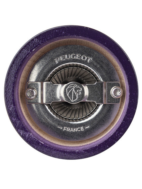 Peugeot | Bistro Salt Mill, Eggplant, featuring a top-down view of its durable, adjustable grinding mechanism with PEUGEOT – FRANCE stamped on the central burr.