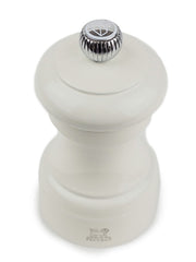 Peugeot | Bistro Salt Mill, Ivory: A classic beech wood grinder with a steel mechanism for coarse salt, perfect for enhancing any kitchen table setting.
