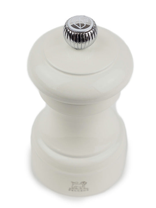 Peugeot | Bistro Salt Mill, Ivory: A classic beech wood grinder with a steel mechanism for coarse salt, perfect for enhancing any kitchen table setting.