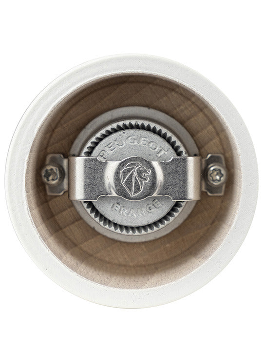 Peugeot | Bistro Pepper Mill, Ivory, showcasing the metal grinding mechanism with visible Peugeot France logo, highlighting adjustable grind size for optimal performance.