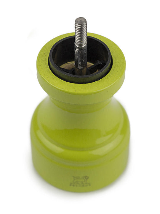 Peugeot | Bistro Pepper Mill, Green Pistachio: Top view showing internal steel mechanism, crafted in France, symbolizing French culinary elegance.