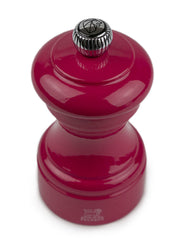 Peugeot | Bistro Pepper Mill, Candy Pink, glossy finish with a metal adjustment knob and lion logo at the base, embodies durability and style from Athens Cooks.