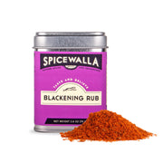 Spicewalla Blackening Rub tin with a heap of reddish-brown seasoning, ideal for adding smoky, crispy flavor to fish or chicken dishes.