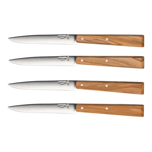 Opinel | Bon Appétit No.125 Steak & Table Knives Sets feature four olivewood-handled knives with sharp, stainless-steel blades, ideal for elegant dining.