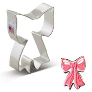 Ann Clark | Holiday Cookie Cutters - Star-3.5 displayed alongside a cookie with pink icing, exemplifying quality baking tools for creative kitchen endeavors.