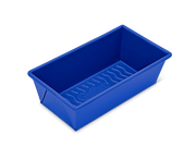 Great Jones | Breadwinner - Raspberry: A close-up of a blue rectangular baking dish with a wavy, corrugated bottom and nonstick ceramic coating for easy release.