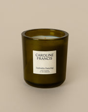 Caroline Francis - Daffodils at Play candle in a glass container with a visible label, hand-poured coconut soy wax, 7.5 oz, 45-50 hour burn time.