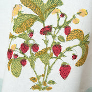 Close-up of Caravan Home's 59 x 86 Fraises des Bois Blue Tablecloth, showcasing detailed plant embroidery, embodying vibrant countryside aesthetics and artisan craftsmanship.