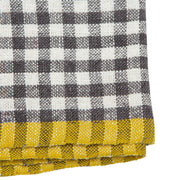 Caravan Home | 20 x 30 Gingham Grey & Dijon Towels featuring a black-and-white checked pattern with a distinctive yellow-striped border, perfect for any kitchen setting.