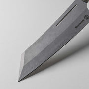 Messermeister | Bunka 8 Chef's Knife: Close-up of the carbon-steel blade with angular tip, stamped logo, showcasing precision and versatility for serious cooks.