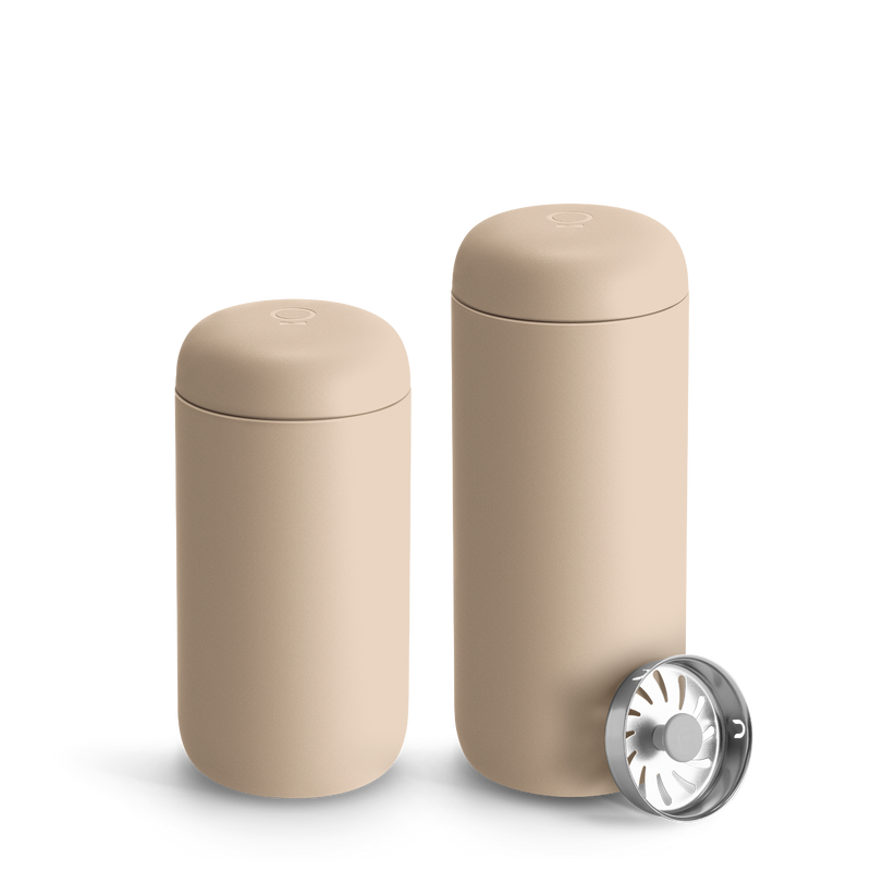 FELLOW | Carter Move Mug, Sand Dune / 16 oz, with ceramic interior and removable strainer, designed for flavor retention and spill-proof travel.