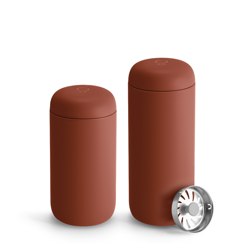 FELLOW | Carter Move Mug, Sienna / 16 oz: Rust-red canisters with lids and a stainless-steel filter, designed for spill-proof, temperature-maintaining coffee on-the-go.