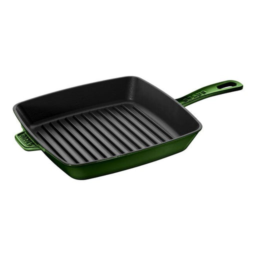 Staub Cast Iron Square Grill Pan, ideal for indoor grilling with authentic grill marks and efficient fat drainage, showcased against a simple background.