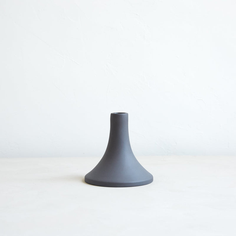 The Floral Society | Candle Holders, Grand, Matte White Tall, features a sleek, minimalistic design with a flared base and narrow neck, ideal for standard taper candles.