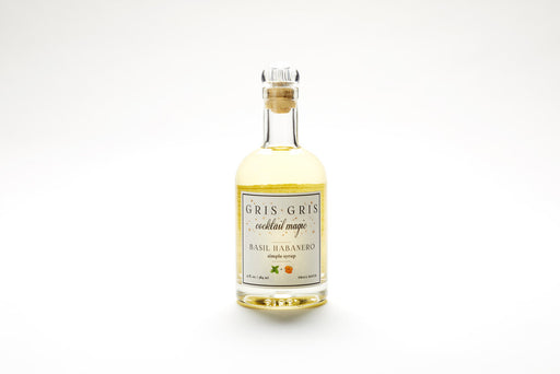 Basil Habanero mixer bottle, showcasing Gris Gris Cocktail Magic Simple Syrup, crafted for enhancing cocktails with a spicy, aromatic blend of fresh basil and habaneros.