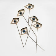 Joanna Buchanan | Cocktail Picks - Bee, featuring a close-up of artistic bee-themed pins, ideal for enhancing barware with a creative, elegant touch.