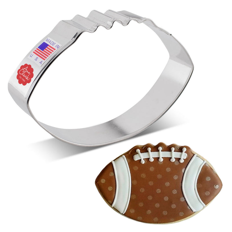 Ann Clark Football cookie cutter with a football-shaped cookie, ideal for sports-themed baking, from America's largest cookie cutter manufacturer, enhancing your baking projects.