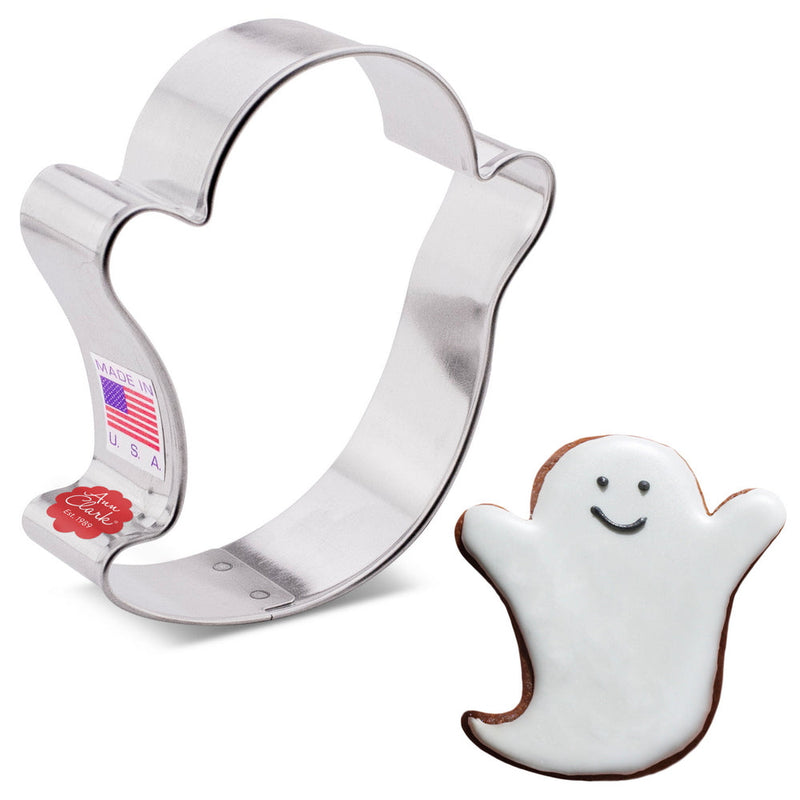 Ann Clark Ghost cookie cutter from Rutland, Vermont, alongside a cookie with white frosting, showcasing premium baking quality for creative Halloween treats.