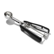 OXO Cookie Scoops - Large; a stainless steel tool with a spring-loaded handle and non-slip grip for easy dough release, perfect for uniform cookies.