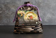 Thai for Two Cooking Kit - Tom Kha Soup, featuring organic ingredients for authentic flavors, includes a reusable bag, perfect for cooking enthusiasts or as a hostess gift.