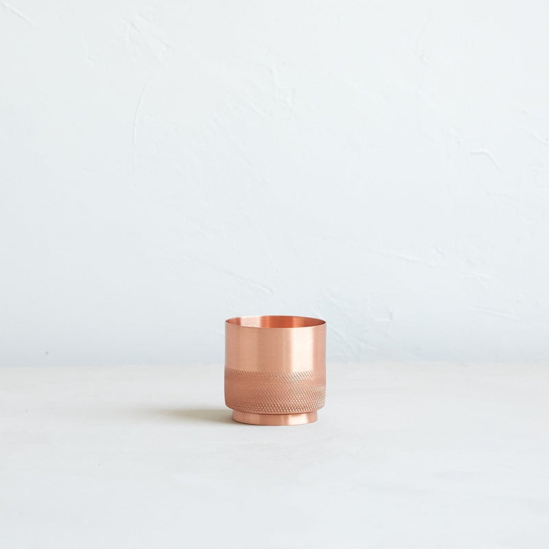 The Floral Society | Match Strike and Holder: A handmade copper cup with a knurled texture for striking matches, perfect for storing matches at home. Matches not included.