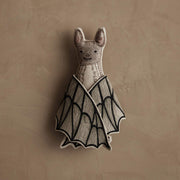 Coral & Tusk | Bat Surprise Doll: Plush bat toy with embroidered face, knitted wings revealing a butterfly motif, featuring a magnet for wing closure.